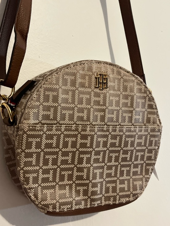 Tommy Hilfiger Handbags - Tommy Hilfiger Beige Monogram Round Crossbody with Brown Strap